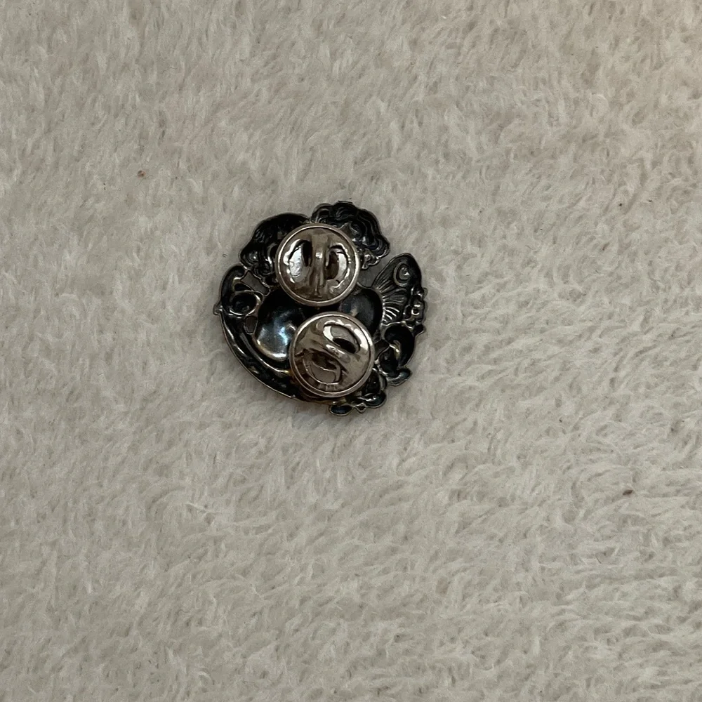 Elegant Silver Cherub Brooch